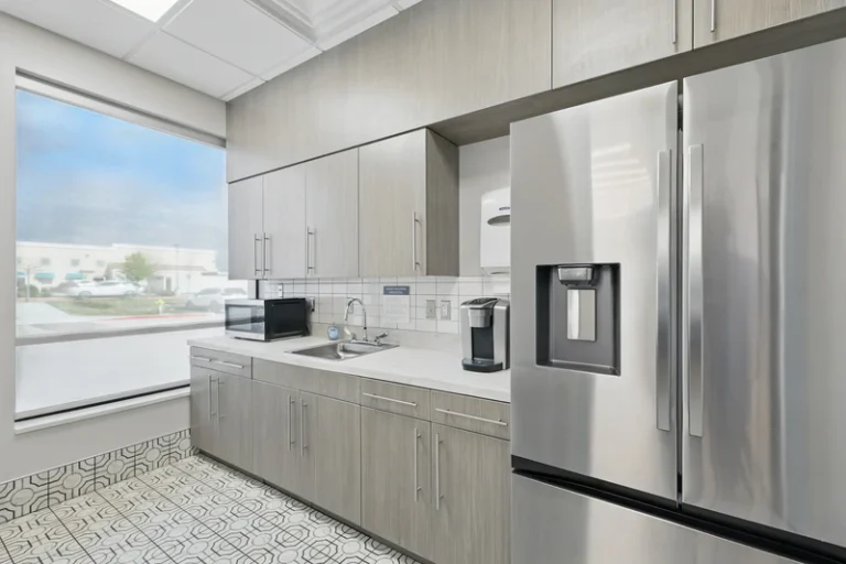 Facility kitchen with stainless appliances.