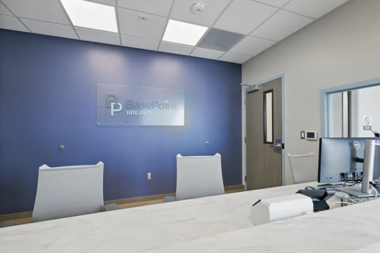 Modern reception area with logo.