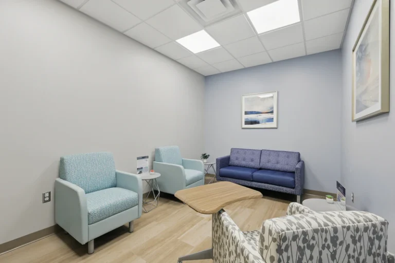 Therapy room with comfortable seating.