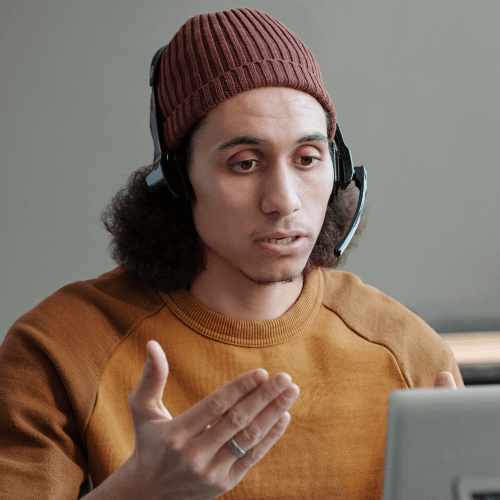 Young man expressing himself during virtual therapy