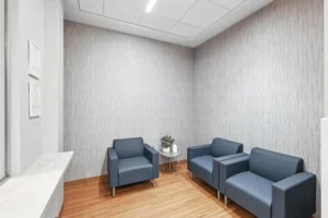 Blue chairs in waiting room