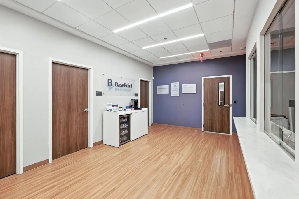 Modern reception area with signage and blue wall