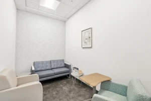Comfortable consultation room with sofa and seating