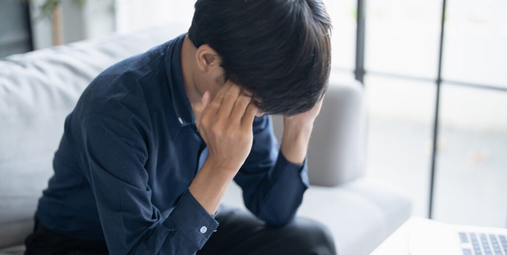 Person showing signs of distress.